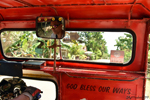 Anda - Filipinos are very religious. The tricycles are painted in honour of Jesus or the Virgin Mary. Before starting the car, the drivers touch their crucifix and sign themselves. Some customers do the same.