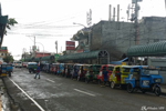 Tagibilaran - Tricycles wait for planes to arrive at the airport to hail customers. Don't hesitate to haggle over the price
