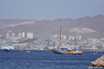 A sailboat in front of Eilat