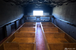The grape crushing vats. In the background, the machine that reproduces foot pressing